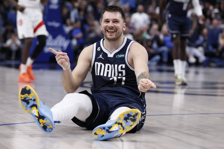 Nov 4, 2022; Dallas, Texas, USA;  Dallas Mavericks guard Luka Doncic (77) reacts after making a basket in the second half against the Toronto Raptors at American Airlines Center. Mandatory Credit: Tim Heitman-USA TODAY Sports