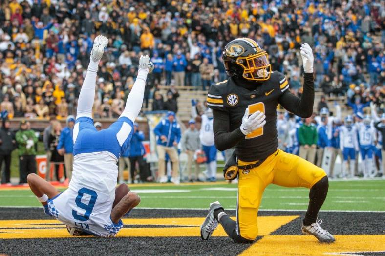 Nov 5, 2022; Columbia, Missouri, USA; Missouri Tigers defensive back Ennis Rakestraw Jr. (2) reacts in the end zone as Kentucky Wildcats wide receiver Dane Key (6) makes a reception for a touch down during the first quarter at Faurot Field at Memorial Stadium. Mandatory Credit: William Purnell-USA TODAY Sports
