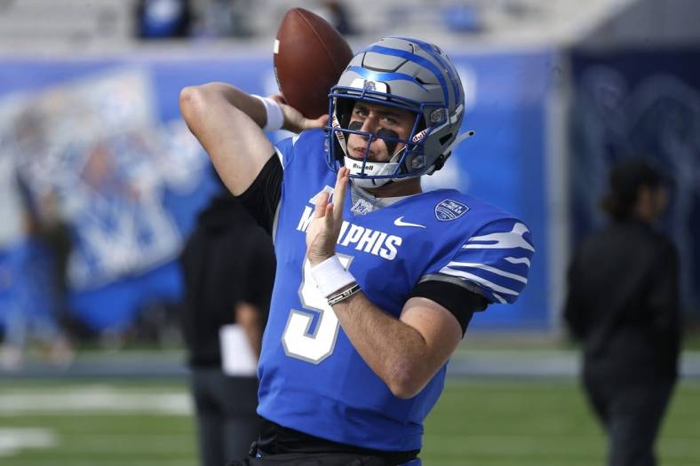 Nov 5, 2022; Memphis, Tennessee, USA; Memphis Tigers quarterback Seth Henigan (5) passes the ball during warm ups prior to the game against the UCF Knights at Liberty Bowl Memorial Stadium. Mandatory Credit: Petre Thomas-USA TODAY Sports