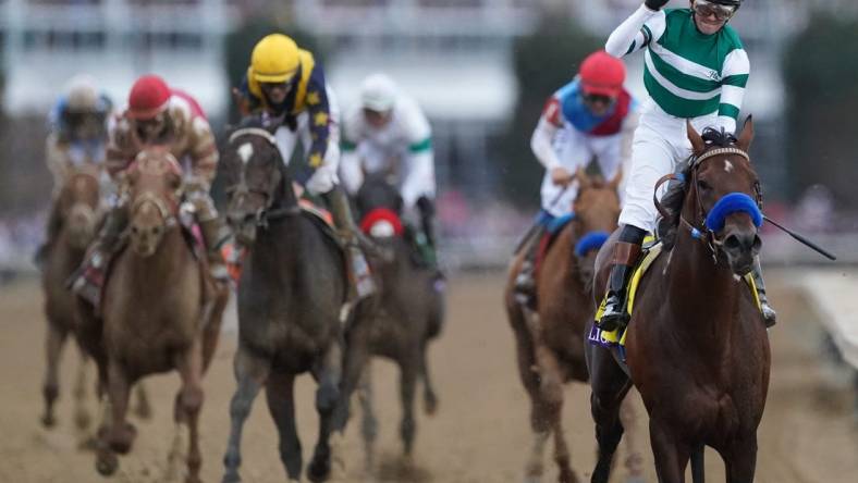 Jockey Flavien Prat celebrates aboard Flightline after winning the Breeders' Cup Classic at Keeneland. Nov. 5, 2022

Race 11 Flightline