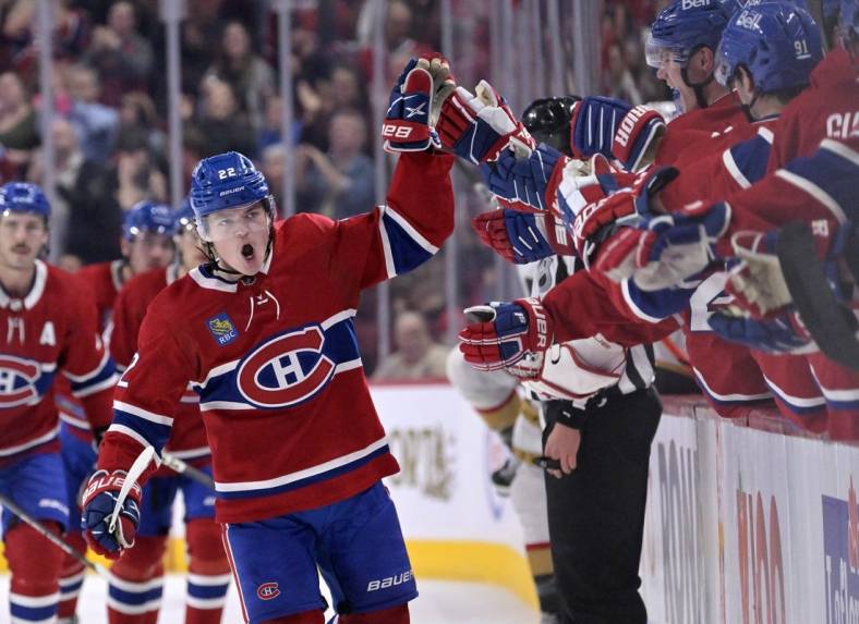 Nov 5, 2022; Montreal, Quebec, CAN; Montreal Canadiens forward Cole Caufield (22) celebrates with teammates after scoring a goal against the Vegas Golden Knights during the first period at the Bell Centre. Mandatory Credit: Eric Bolte-USA TODAY Sports