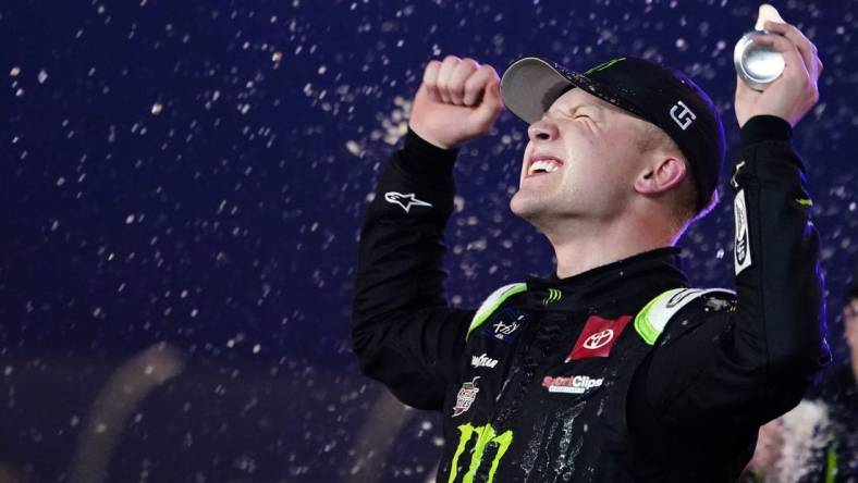 Nov 5, 2022; Avondale, Arizona, USA; Xfinity Series driver Ty Gibbs (54) celebrates winning the Xfinity series championship at Phoenix Raceway. Mandatory Credit: John David Mercer-USA TODAY Sports