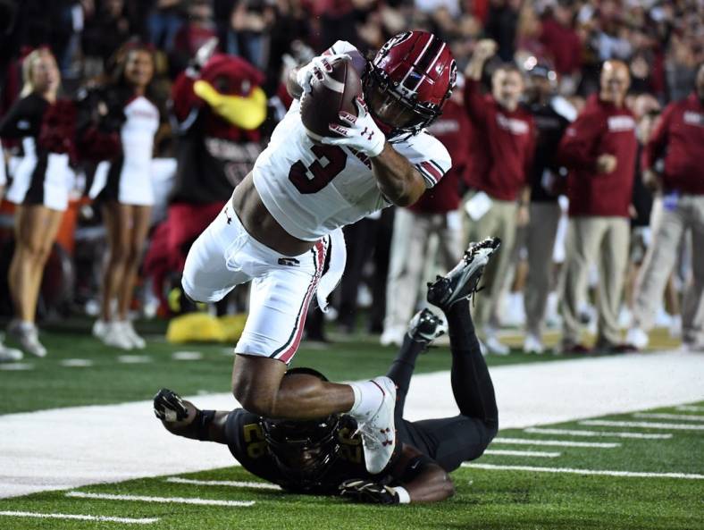 Nov 5, 2022; Nashville, Tennessee, USA; South Carolina Gamecocks wide receiver Antwane Wells Jr. (3) dives into the end zone past a tackle attempt from Vanderbilt Commodores cornerback BJ Anderson (26) during the first half at FirstBank Stadium. Mandatory Credit: Christopher Hanewinckel-USA TODAY Sports