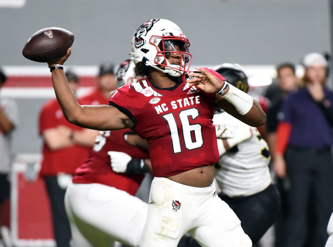 Nov 5, 2022; Raleigh, North Carolina, USA; North Carolina State Wolfpack quarterback MJ Morris (16) throws a pass during the first half against the Wake Forest Demon Deacons at Carter-Finley Stadium. Mandatory Credit: Rob Kinnan-USA TODAY Sports