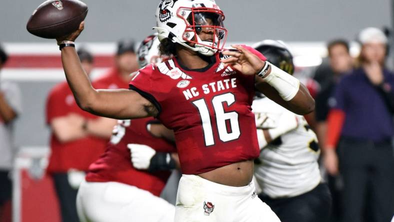 Nov 5, 2022; Raleigh, North Carolina, USA; North Carolina State Wolfpack quarterback MJ Morris (16) throws a pass during the first half against the Wake Forest Demon Deacons at Carter-Finley Stadium. Mandatory Credit: Rob Kinnan-USA TODAY Sports