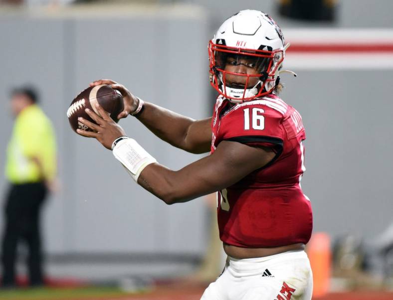 Nov 5, 2022; Raleigh, North Carolina, USA; North Carolina State Wolfpack quarterback MJ Morris (16) throws a pass during the first half against the Wake Forest Demon Deacons at Carter-Finley Stadium. Mandatory Credit: Rob Kinnan-USA TODAY Sports