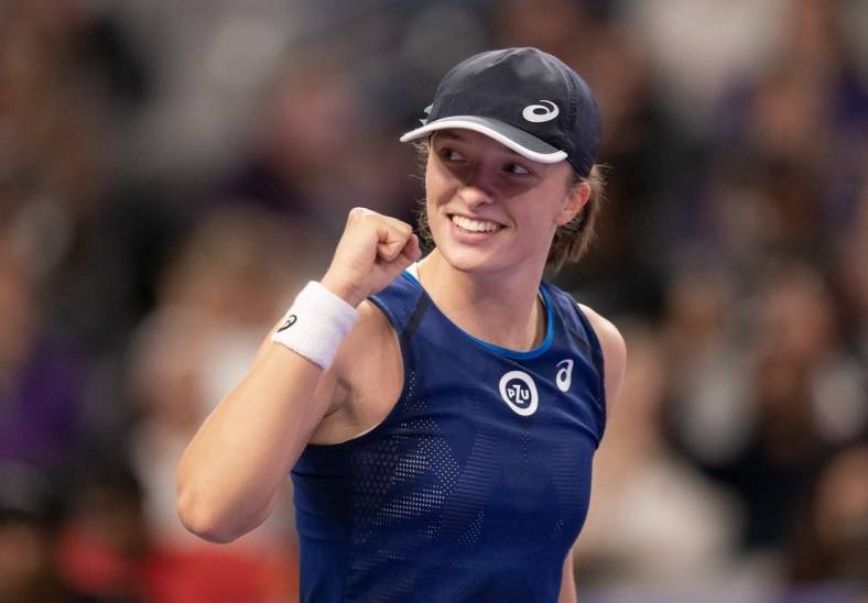 Nov 5, 2022; Forth Worth, TX, USA; Iga Swiatek (POL) celebrates after defeating Coco Gauff (USA) on day six of the WTA Finals at Dickies Arena. Mandatory Credit: Susan Mullane-USA TODAY Sports