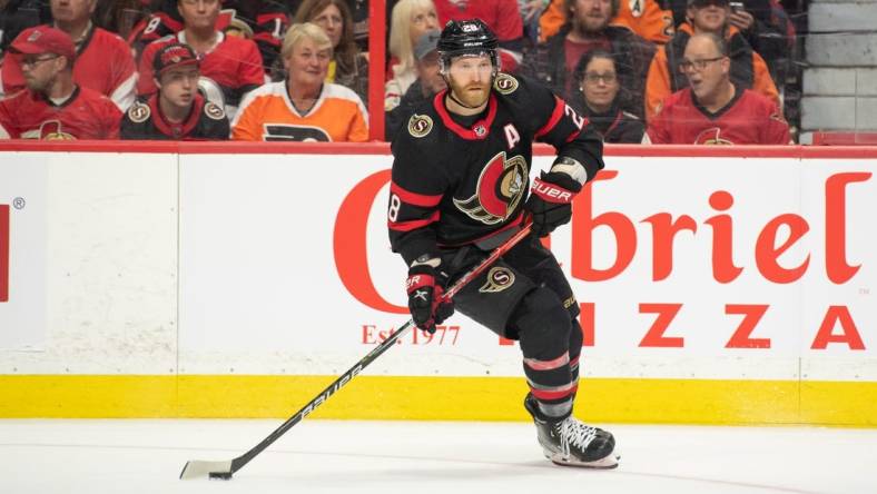 Nov 5, 2022; Ottawa, Ontario, CAN; Ottawa Senators right wing Claude Giroux (28) skates with the puck in the second period against the Philadelphia Flyers at the Canadian Tire Centre. Mandatory Credit: Marc DesRosiers-USA TODAY Sports