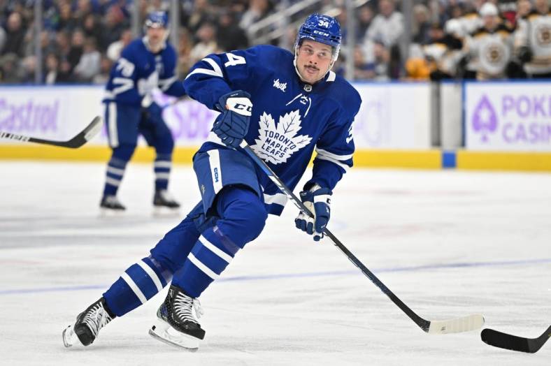 Nov 5, 2022; Toronto, Ontario, CAN;  Toronto Maple Leafs forward Auston Matthews (34) pursues the play against the Boston Bruins in the second period at Scotiabank Arena. Mandatory Credit: Dan Hamilton-USA TODAY Sports