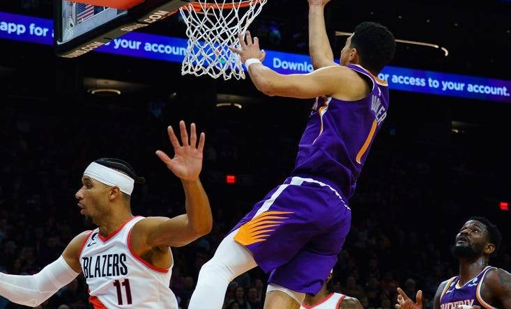 Nov 5, 2022; Phoenix, Arizona, USA; Phoenix Suns guard Devin Booker (1) drives to the basket against the Portland Trail Blazers during the first half at Footprint Center. Mandatory Credit: Allan Henry-USA TODAY Sports