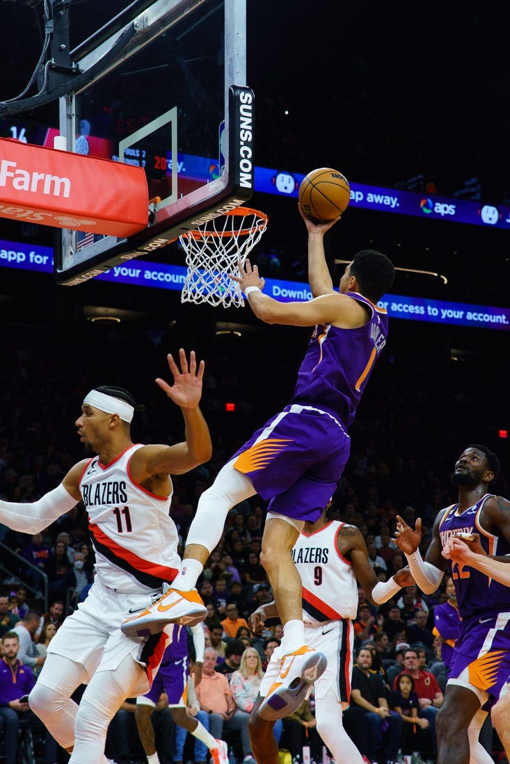 Nov 5, 2022; Phoenix, Arizona, USA; Phoenix Suns guard Devin Booker (1) drives to the basket against the Portland Trail Blazers during the first half at Footprint Center. Mandatory Credit: Allan Henry-USA TODAY Sports
