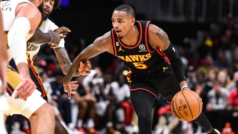 Nov 5, 2022; Atlanta, Georgia, USA; Atlanta Hawks guard Dejounte Murray (5) drives the ball against the New Orleans Pelicans in the fourth quarter at State Farm Arena. Mandatory Credit: Larry Robinson-USA TODAY Sports