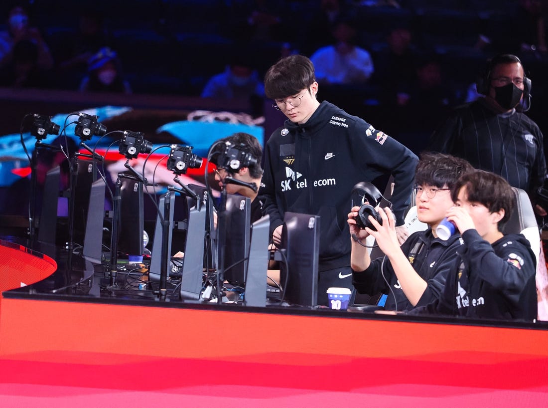 Nov 5, 2022; San Francisco, California, USA; T1 mid laner Lee "Faker" Sang-hyeok sits down to play game 4 against DRX during the League of Legends World Championships at Chase Center. Mandatory Credit: Kelley L Cox-USA TODAY Sports