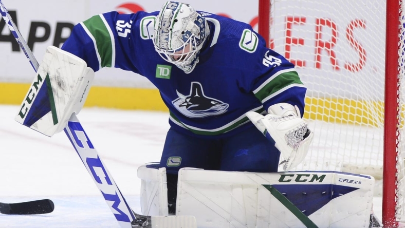 Nov 5, 2022; Vancouver, British Columbia, CAN;  -Vancouver Canucks goaltender Thatcher Demko (35) blocks a shot on net by the Nashville Predators during overtime at Rogers Arena. Mandatory Credit: Anne-Marie Sorvin-USA TODAY Sports