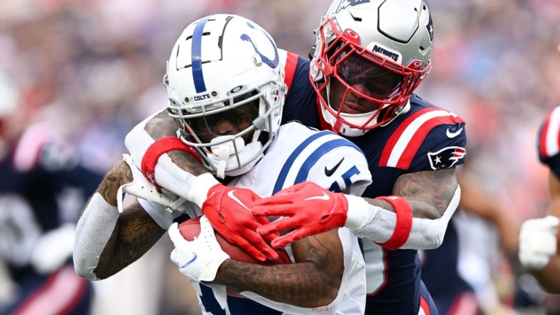Nov 6, 2022; Foxborough, Massachusetts, USA; New England Patriots linebacker Mack Wilson Sr. (30) tackles Indianapolis Colts wide receiver Keke Coutee (15) during the first half at Gillette Stadium. Mandatory Credit: Brian Fluharty-USA TODAY Sports