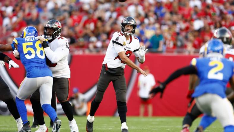 Nov 6, 2022; Tampa, Florida, USA; Tampa Bay Buccaneers quarterback Tom Brady (12) looks to pass the ball against the Los Angeles Rams during the first quarter at Raymond James Stadium. Mandatory Credit: Douglas DeFelice-USA TODAY Sports