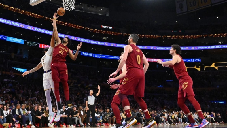 Nov 6, 2022; Los Angeles, California, USA; Cleveland Cavaliers center Jarrett Allen (31) beats Los Angeles Lakers forward Anthony Davis (3) to a rebound in the second half at Crypto.com Arena. Mandatory Credit: Jayne Kamin-Oncea-USA TODAY Sports