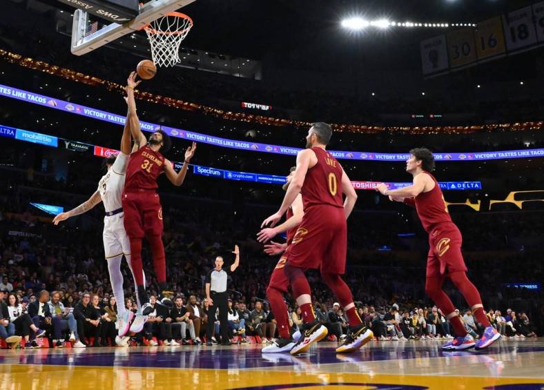 Nov 6, 2022; Los Angeles, California, USA; Cleveland Cavaliers center Jarrett Allen (31) beats Los Angeles Lakers forward Anthony Davis (3) to a rebound in the second half at Crypto.com Arena. Mandatory Credit: Jayne Kamin-Oncea-USA TODAY Sports