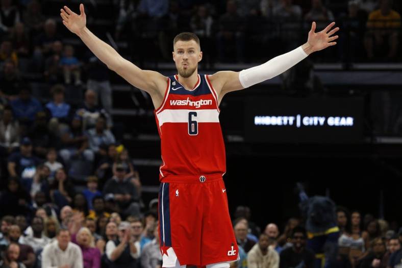 Nov 6, 2022; Memphis, Tennessee, USA; Washington Wizards center Kristaps Porzingis (6) reacts after a foul call during the second half against the Memphis Grizzlies at FedExForum. Mandatory Credit: Petre Thomas-USA TODAY Sports
