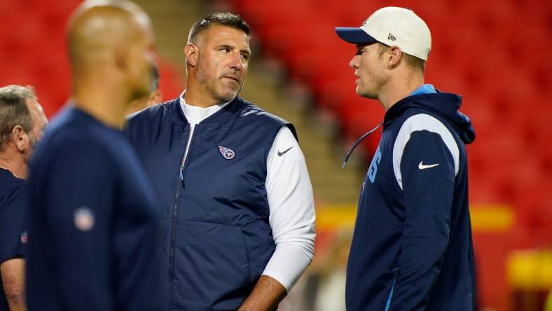 Nov 6, 2022; Kansas City, Missouri, USA; Tennessee Titans head coach Mike Vrabel talks to quarterback Ryan Tannehill (17) before facing the Kansas City Chiefs  at GEHA Field at Arrowhead Stadium. Mandatory Credit: George Walker IV / Tennessean.com