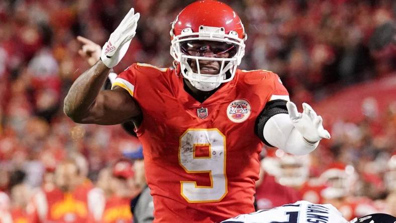 Nov 6, 2022; Kansas City, Missouri, USA; Kansas City Chiefs wide receiver JuJu Smith-Schuster (9) celebrates after a catch and run against the Tennessee Titans during overtime of the game at GEHA Field at Arrowhead Stadium. Mandatory Credit: Denny Medley-USA TODAY Sports