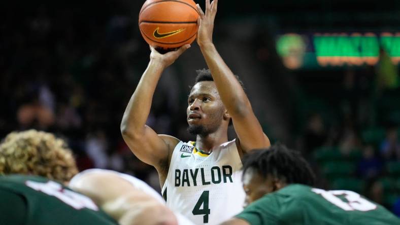 Nov 7, 2022; Waco, Texas, USA; Baylor Bears guard LJ Cryer (4) makes a free throw against the Mississippi Valley State Delta Devils during the first half at Ferrell Center. Mandatory Credit: Chris Jones-USA TODAY Sports