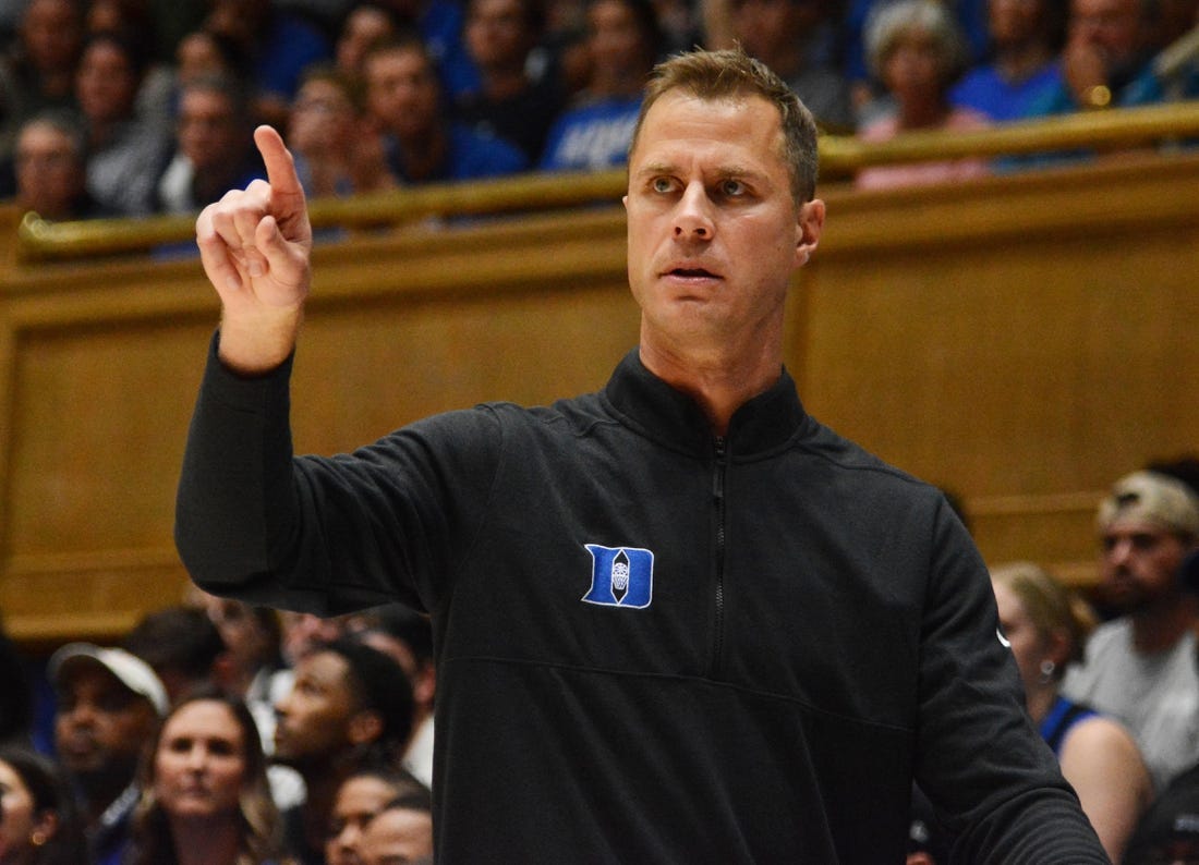 Nov 7, 2022; Durham, North Carolina, USA; Duke Blue Devils head coach Jon Scheyer directs his team during the first half against the Jacksonville Dolphins at Cameron Indoor Stadium. Mandatory Credit: Rob Kinnan-USA TODAY Sports