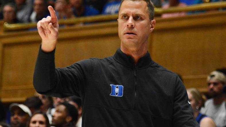 Nov 7, 2022; Durham, North Carolina, USA; Duke Blue Devils head coach Jon Scheyer directs his team during the first half against the Jacksonville Dolphins at Cameron Indoor Stadium. Mandatory Credit: Rob Kinnan-USA TODAY Sports