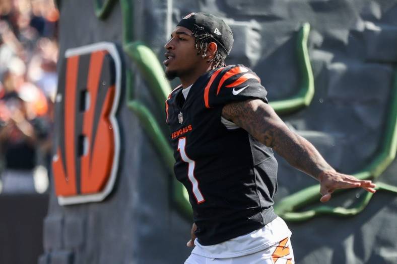 Oct 23, 2022; Cincinnati, Ohio, USA; Cincinnati Bengals wide receiver Ja'Marr Chase (1) runs onto the field prior to the game against the Atlanta Falcons at Paycor Stadium. Mandatory Credit: Katie Stratman-USA TODAY Sports