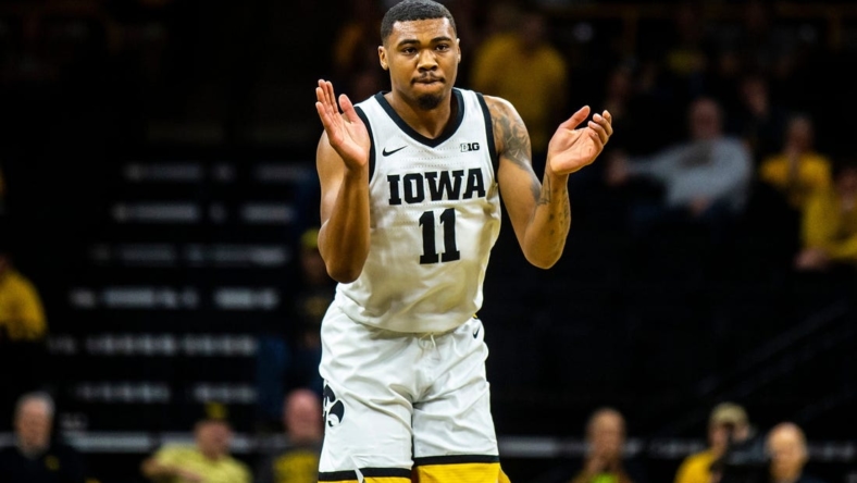 Iowa guard Tony Perkins (11) reacts after a basket during a NCAA men's basketball game against Bethune-Cookman, Monday, Nov. 7, 2022, at Carver-Hawkeye Arena in Iowa City, Iowa.

221107 Bethune Cookman Iowa Mbb 039 Jpg