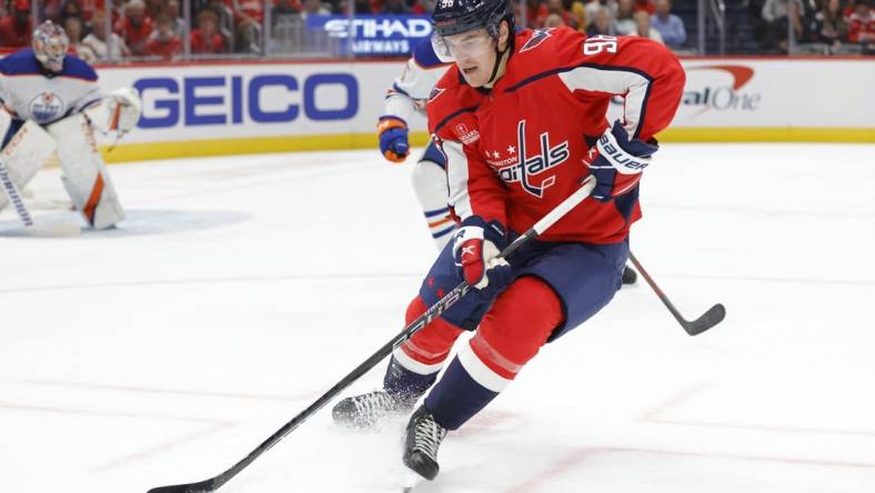 Nov 7, 2022; Washington, District of Columbia, USA; Washington Capitals right wing Nicolas Aube-Kubel (96) skates with the puck against the Edmonton Oilers in the first period at Capital One Arena. Mandatory Credit: Geoff Burke-USA TODAY Sports