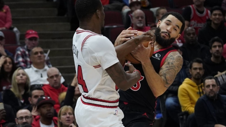 Nov 7, 2022; Chicago, Illinois, USA; Chicago Bulls forward Javonte Green (24) and Toronto Raptors guard Fred VanVleet (23) go for the ball during the first half at United Center. Mandatory Credit: David Banks-USA TODAY Sports