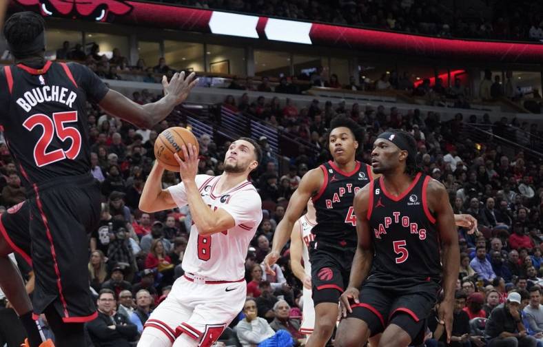 Nov 7, 2022; Chicago, Illinois, USA; Chicago Bulls guard Zach LaVine (8) goes to the basket against the Toronto Raptors during the first half at United Center. Mandatory Credit: David Banks-USA TODAY Sports