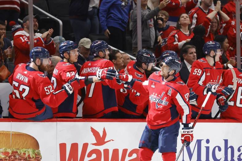 Nov 7, 2022; Washington, District of Columbia, USA;Washington Capitals center Evgeny Kuznetsov (92) celebrates with teammates after scoring a goal against the Edmonton Oilers in the second period  at Capital One Arena. Mandatory Credit: Geoff Burke-USA TODAY Sports