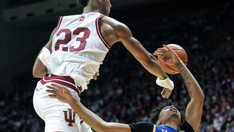 Nov 7, 2022; Bloomington, Indiana, USA;  Indiana Hoosiers forward Trayce Jackson-Davis (23) blocks the shot attempt from Morehead State Eagles guard Trent Scott (11) during the second half at Simon Skjodt Assembly Hall. Mandatory Credit: Robert Goddin-USA TODAY Sports