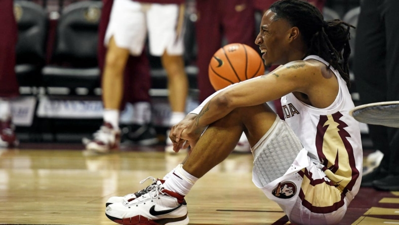 Nov 7, 2022; Tallahassee, Florida, USA; Florida State Seminoles guard Caleb Mills (4) reacts to the loss at the end of the second half against the Stetson Hatters at Donald L. Tucker Center. Mandatory Credit: Melina Myers-USA TODAY Sports