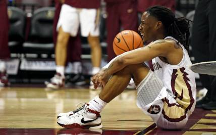 Nov 7, 2022; Tallahassee, Florida, USA; Florida State Seminoles guard Caleb Mills (4) reacts to the loss at the end of the second half against the Stetson Hatters at Donald L. Tucker Center. Mandatory Credit: Melina Myers-USA TODAY Sports