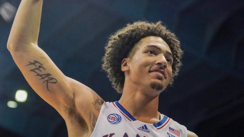 Nov 7, 2022; Lawrence, Kansas, USA; Kansas Jayhawks forward Jalen Wilson (10) celebrates with teammates after a score against the Omaha Mavericks during the second half at Allen Fieldhouse. Mandatory Credit: Denny Medley-USA TODAY Sports