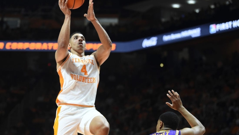 Tennessee guard Tyreke Key (4) tries to score over Tennessee Tech guard Ty Perry (0) during an NCAA college basketball game between Tennessee and Tennessee Tech on Monday, November 7, 2022 in Knoxville, Tenn.

Kns Vols Hoops Tntech
