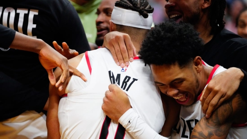 Nov 7, 2022; Miami, Florida, USA; Portland Trail Blazers guard Josh Hart (11) celebrates the game winning basket with team mates against the Miami Heat during the fourth quarter at FTX Arena. Mandatory Credit: Rich Storry-USA TODAY Sports