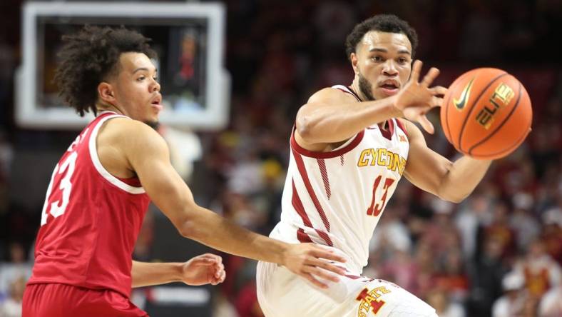 Iowa State University Cyclones guard Jaren Holmes (13) passes the ball around IUPUI Jaguars guard DJ Jackson (13)during the second half in the season opening home game at Hilton Coliseum Monday, Nov. 7, 2022, in Ames, Iowa.  Photo by Nirmalendu Majumdar/Ames Tribune

Ncaa Men S Basketball