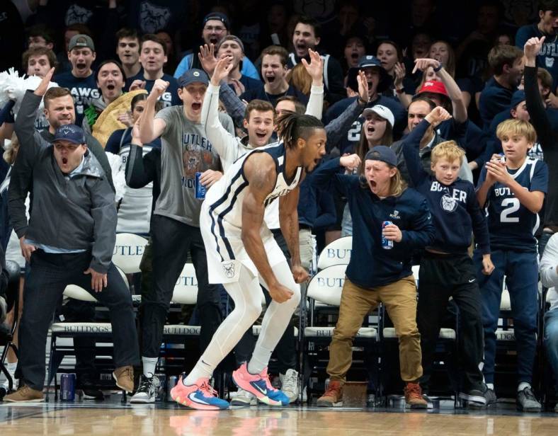 Butler Bulldogs fans celebrate with Butler Bulldogs center Manny Bates (15) after throwing down a dunk Monday, Nov. 7, 2022, at Hinkle Fieldhouse in Indianapolis.

Butler 11072022 Af037