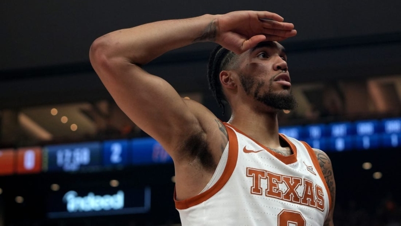 Texas Longhorns' Timmy Allen salutes the student section after scoring during the game against UTEP Miners Monday, Nov. 7, 2022, at the Moody Center in Austin.

Ut Vs Utep Mens Bball Bsa 004