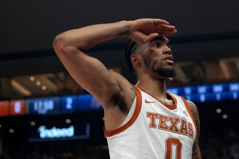 Texas Longhorns' Timmy Allen salutes the student section after scoring during the game against UTEP Miners Monday, Nov. 7, 2022, at the Moody Center in Austin.

Ut Vs Utep Mens Bball Bsa 004