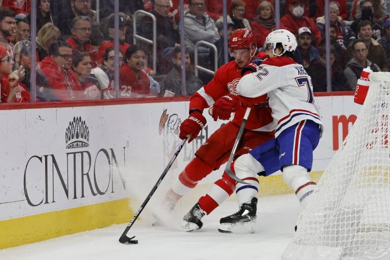 Nov 8, 2022; Detroit, Michigan, USA; Detroit Red Wings left wing Elmer Soderblom (85) and Montreal Canadiens defenseman Arber Xhekaj (72) battle for the puck in the second period at Little Caesars Arena. Mandatory Credit: Rick Osentoski-USA TODAY Sports