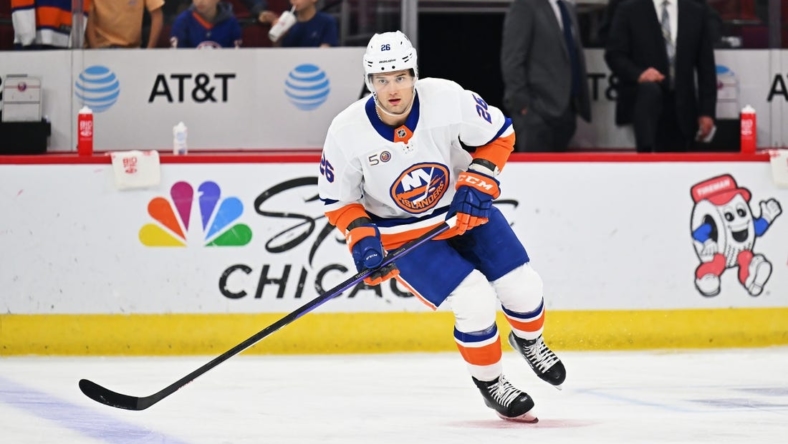 Nov 1, 2022; Chicago, Illinois, USA;  New York Islanders forward Oliver Wahlstrom (26) warms up before a game against the Chicago Blackhawks at the United Center. Mandatory Credit: Jamie Sabau-USA TODAY Sports