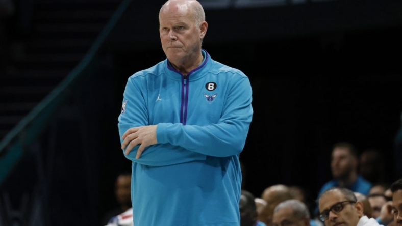 Nov 9, 2022; Charlotte, North Carolina, USA; Charlotte Hornets head coach Steve Clifford watches his team against the Portland Trail Blazers in the second half at Spectrum Center. The Portland Trail Blazers won 105-95. Mandatory Credit: Nell Redmond-USA TODAY Sports