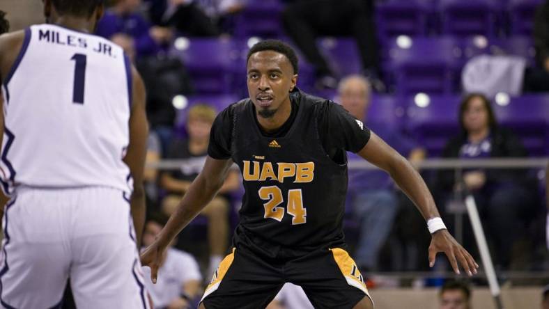 Nov 7, 2022; Fort Worth, Texas, USA; Arkansas-Pine Bluff Golden Lions guard AC Curry (24) in action during the game between the TCU Horned Frogs and the Arkansas-Pine Bluff Golden Lions at Ed and Rae Schollmaier Arena. Mandatory Credit: Jerome Miron-USA TODAY Sports