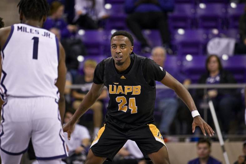 Nov 7, 2022; Fort Worth, Texas, USA; Arkansas-Pine Bluff Golden Lions guard AC Curry (24) in action during the game between the TCU Horned Frogs and the Arkansas-Pine Bluff Golden Lions at Ed and Rae Schollmaier Arena. Mandatory Credit: Jerome Miron-USA TODAY Sports