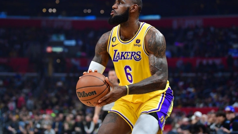 Nov 9, 2022; Los Angeles, California, USA; Los Angeles Lakers forward LeBron James (6) shoots against the Los Angeles Clippers during the first half at Crypto.com Arena. Mandatory Credit: Gary A. Vasquez-USA TODAY Sports